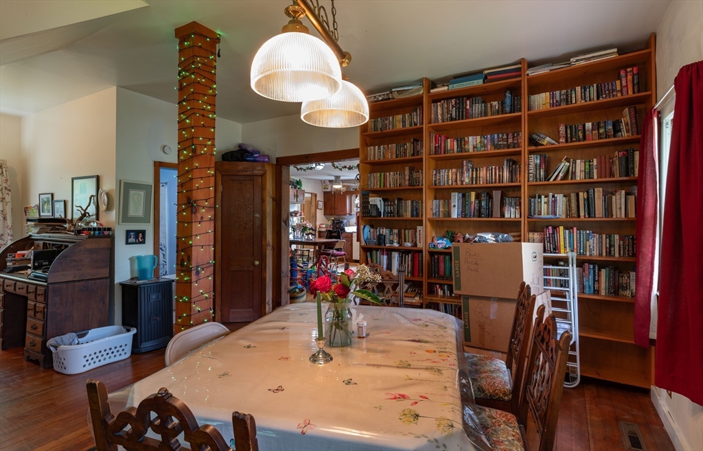 425 Dingle Road Worthington, MA 01098 - Photo 12 of 32 a view of a dining room with furniture and wooden floor