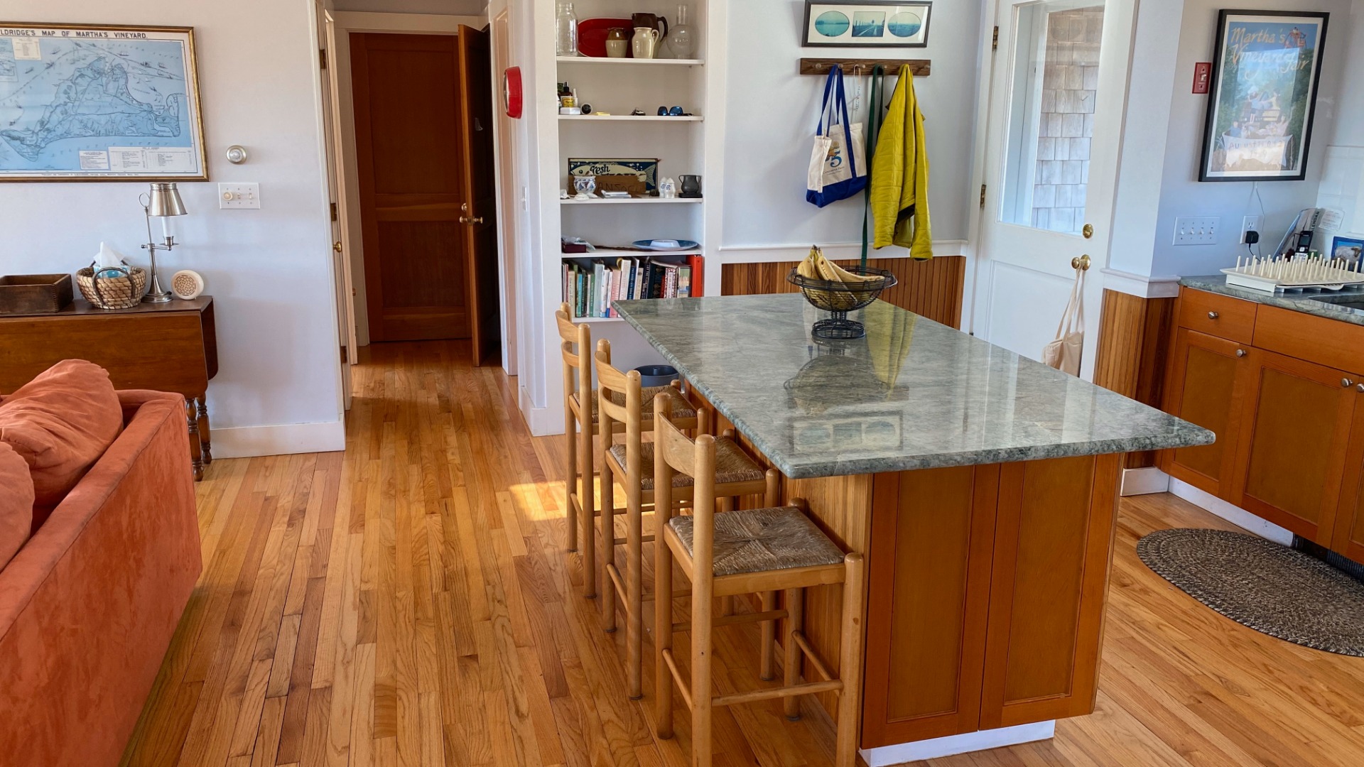 144 Pond View Farm Road West Tisbury, MA 02568 - Photo 5 of 13 a dining room with wooden floor a table and chairs