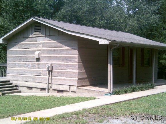 341 Rock Road Rutherfordton, NC 28139 - Photo 6 of 12 a view of a house with a small yard