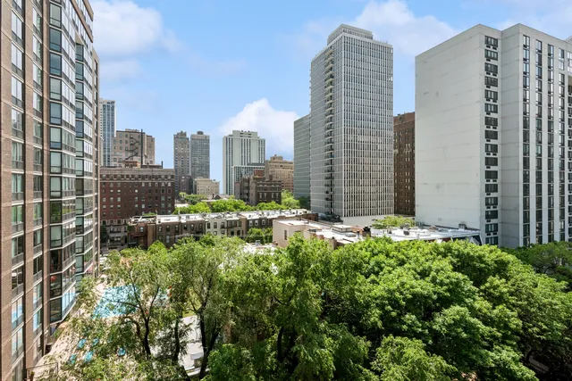 a view of a city with tall buildings