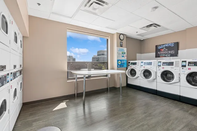 a kitchen with a stove a microwave and a refrigerator