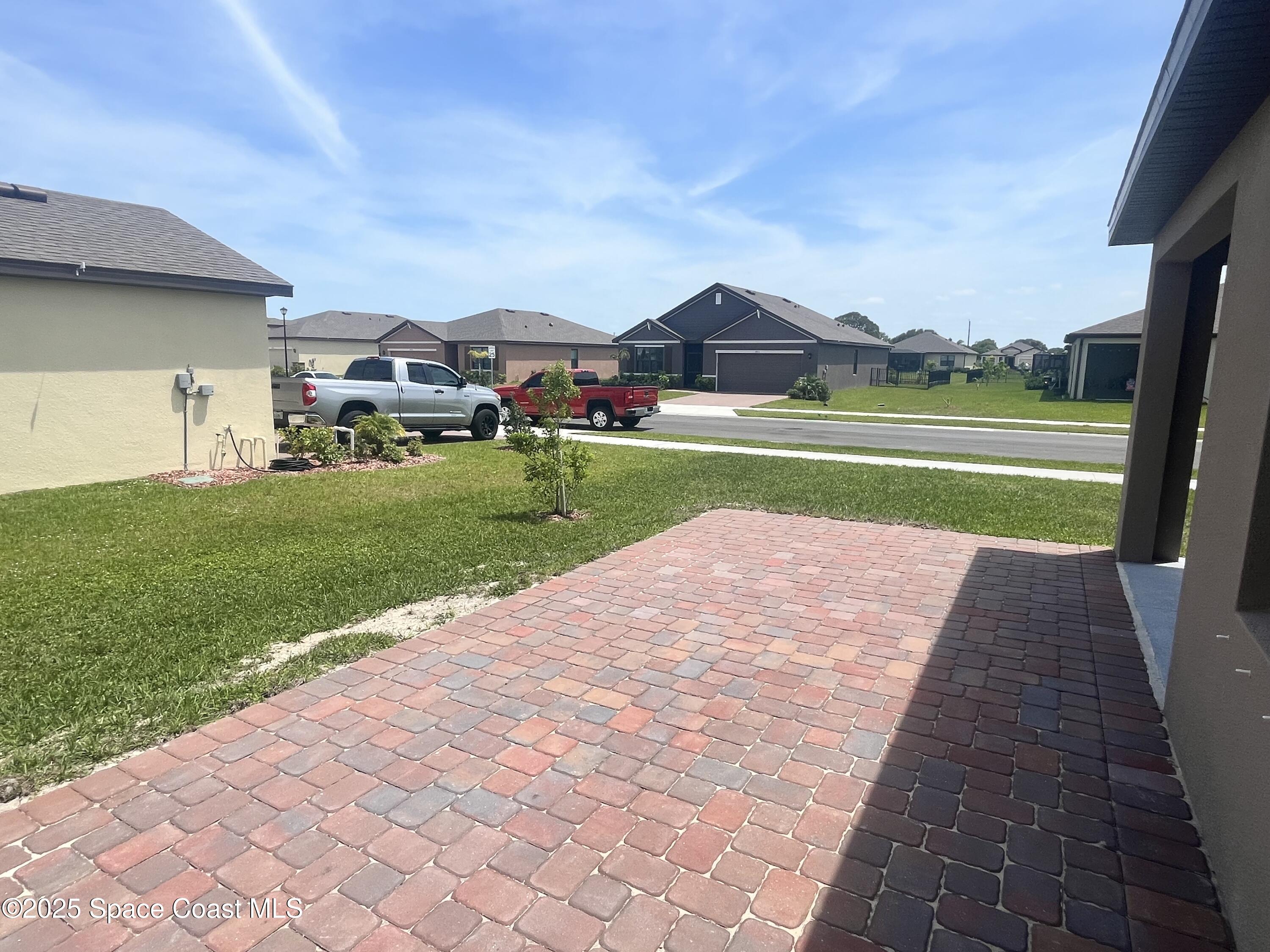 6714 Topaz Drive Grant-Valkaria, FL 32949 - Photo 28 of 33 a view of outdoor space yard and swimming pool