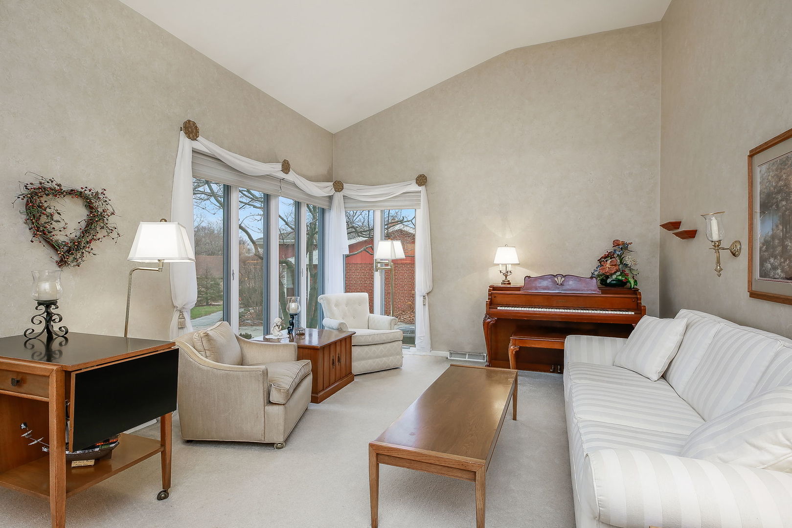 5924 Carpenter Street Downers Grove, IL 60516 - Photo 11 of 28 a living room with furniture and a piano