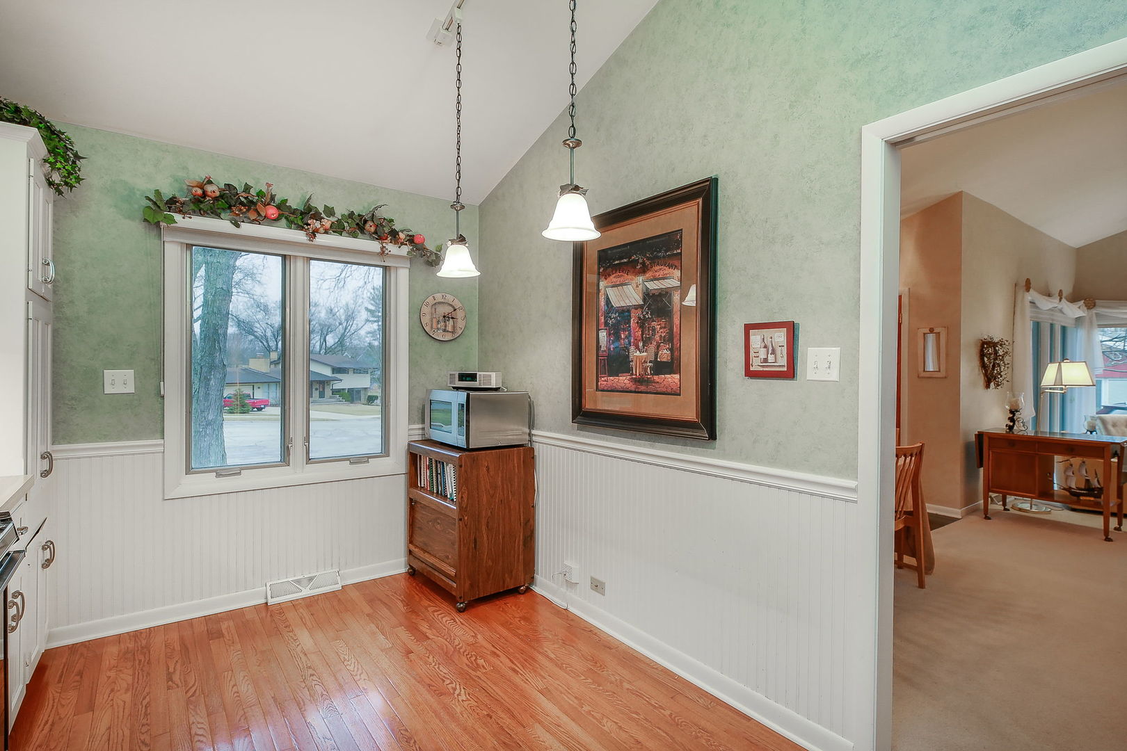 5924 Carpenter Street Downers Grove, IL 60516 - Photo 12 of 28 a view of a room with window and wooden floor