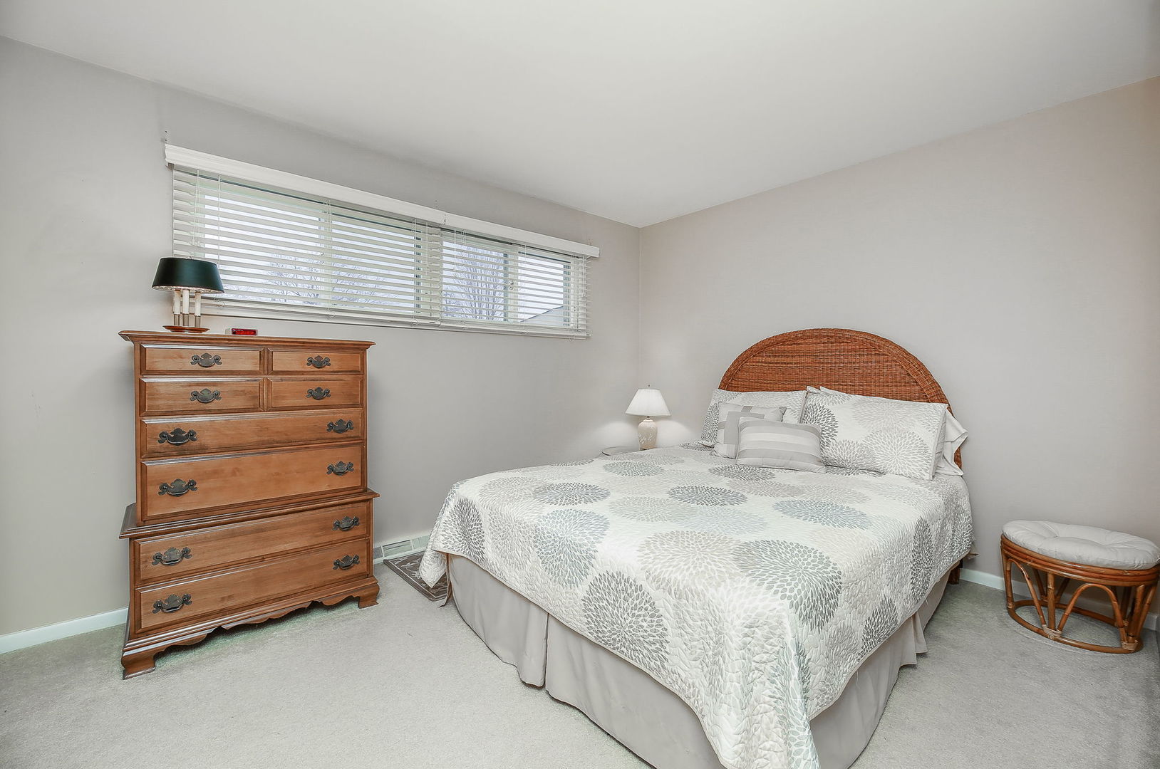 5924 Carpenter Street Downers Grove, IL 60516 - Photo 17 of 28 a bedroom with a bed and a dresser