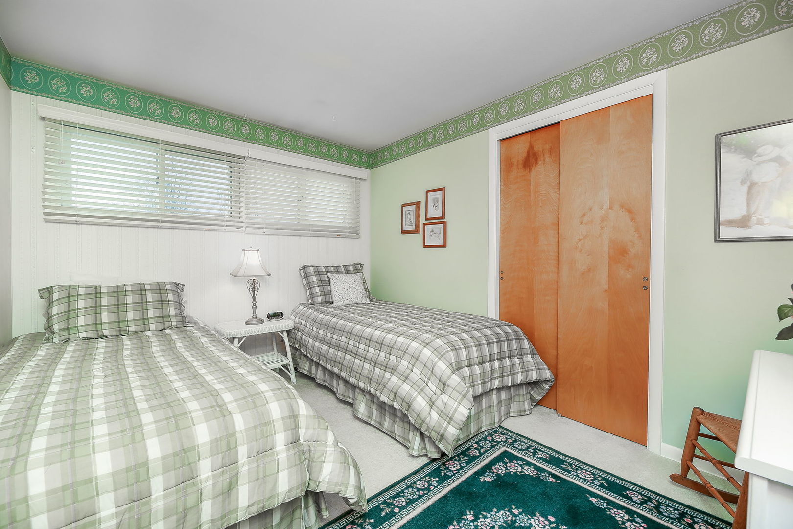 5924 Carpenter Street Downers Grove, IL 60516 - Photo 18 of 28 a bedroom with a bed and wooden floor