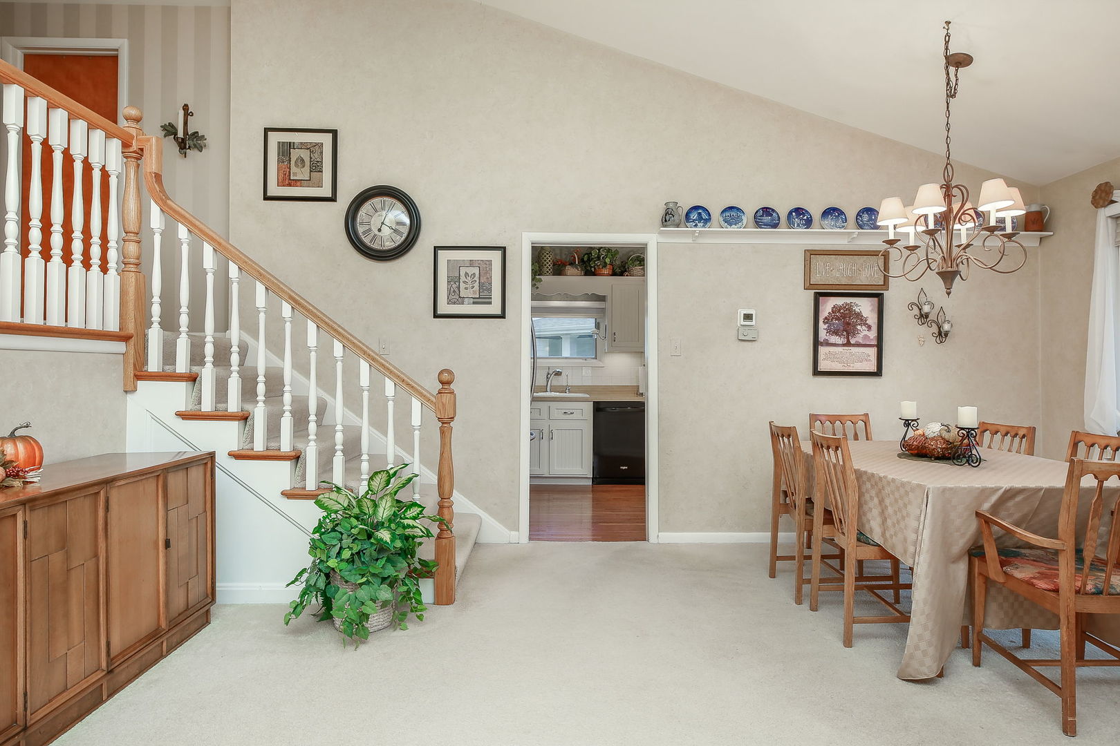 5924 Carpenter Street Downers Grove, IL 60516 - Photo 7 of 28 a dining room with furniture and a chandelier