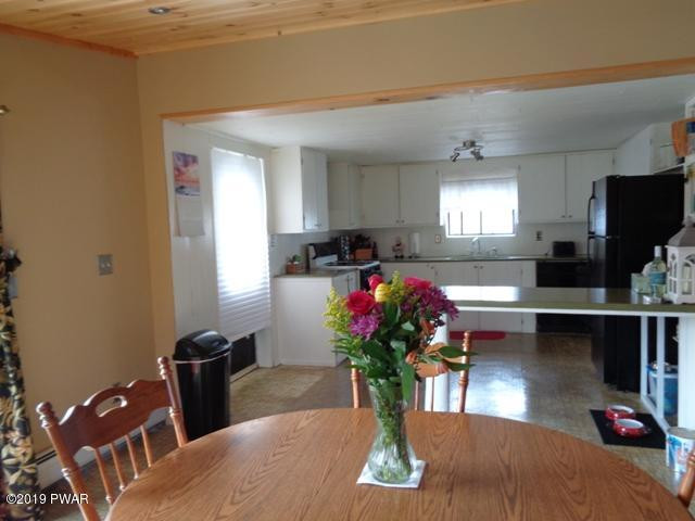475 Rowland Road Greeley, PA 18425 - Photo 11 of 41 Dining Room into Kitchen