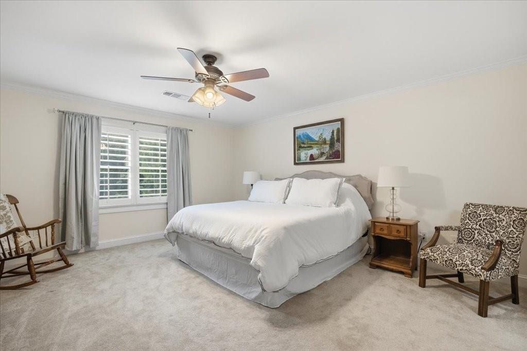 397 Thomas Road Dallas, GA 30132 - Photo 45 of 108 a spacious bedroom with a bed and a window