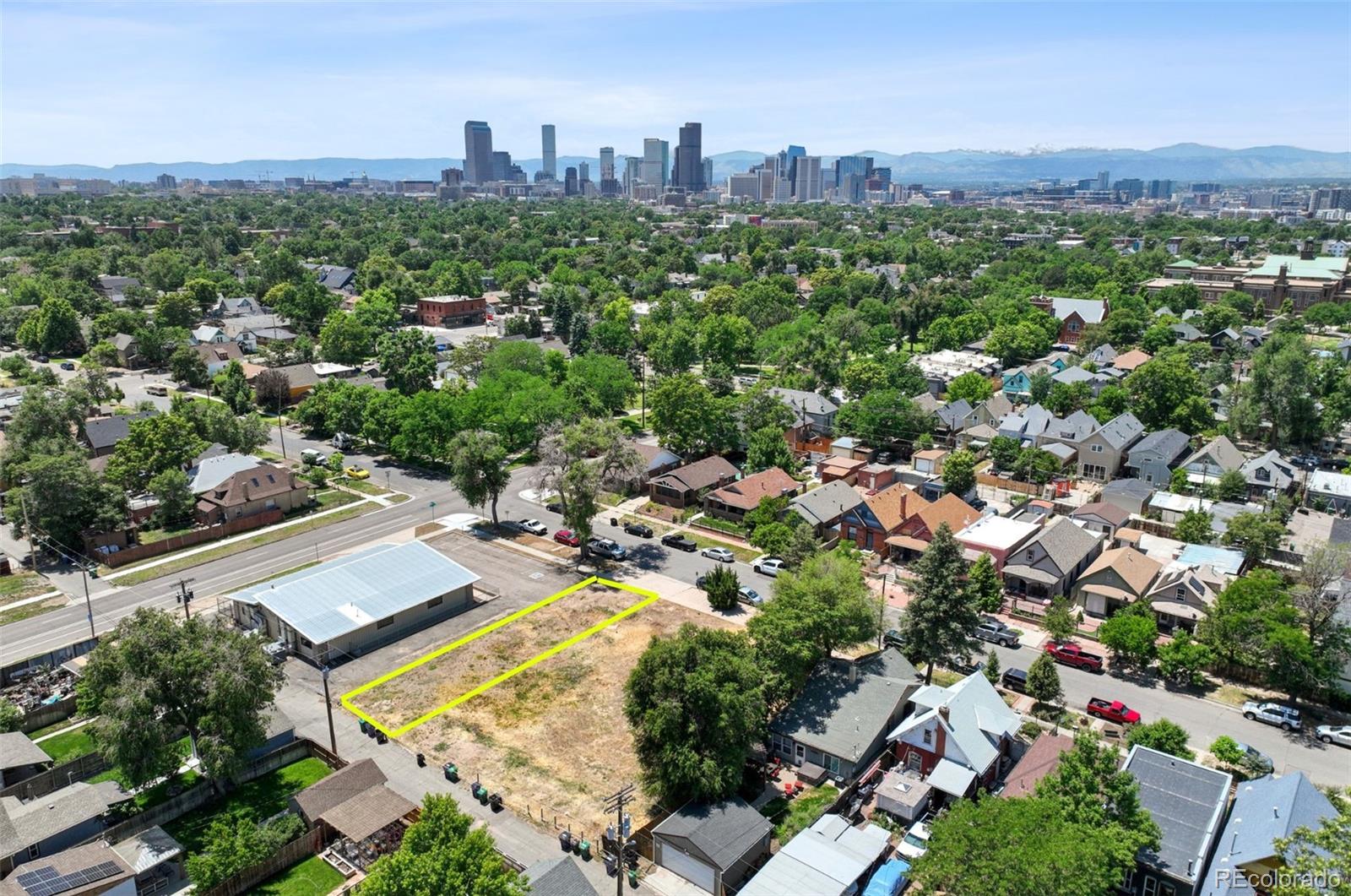 3216 North High Street Denver, CO 80205 - Photo 3 of 6 an aerial view of a city with lots of residential buildings