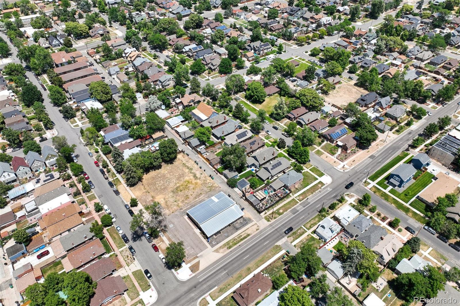 3216 North High Street Denver, CO 80205 - Photo 5 of 6 an aerial view of a residential houses with yard