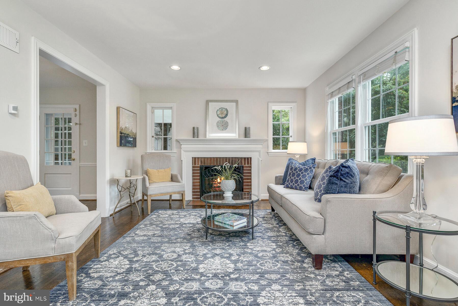 5705 Harwick Road Bethesda, MD 20816 - Photo 3 of 56 Light-filled living room with fireplace