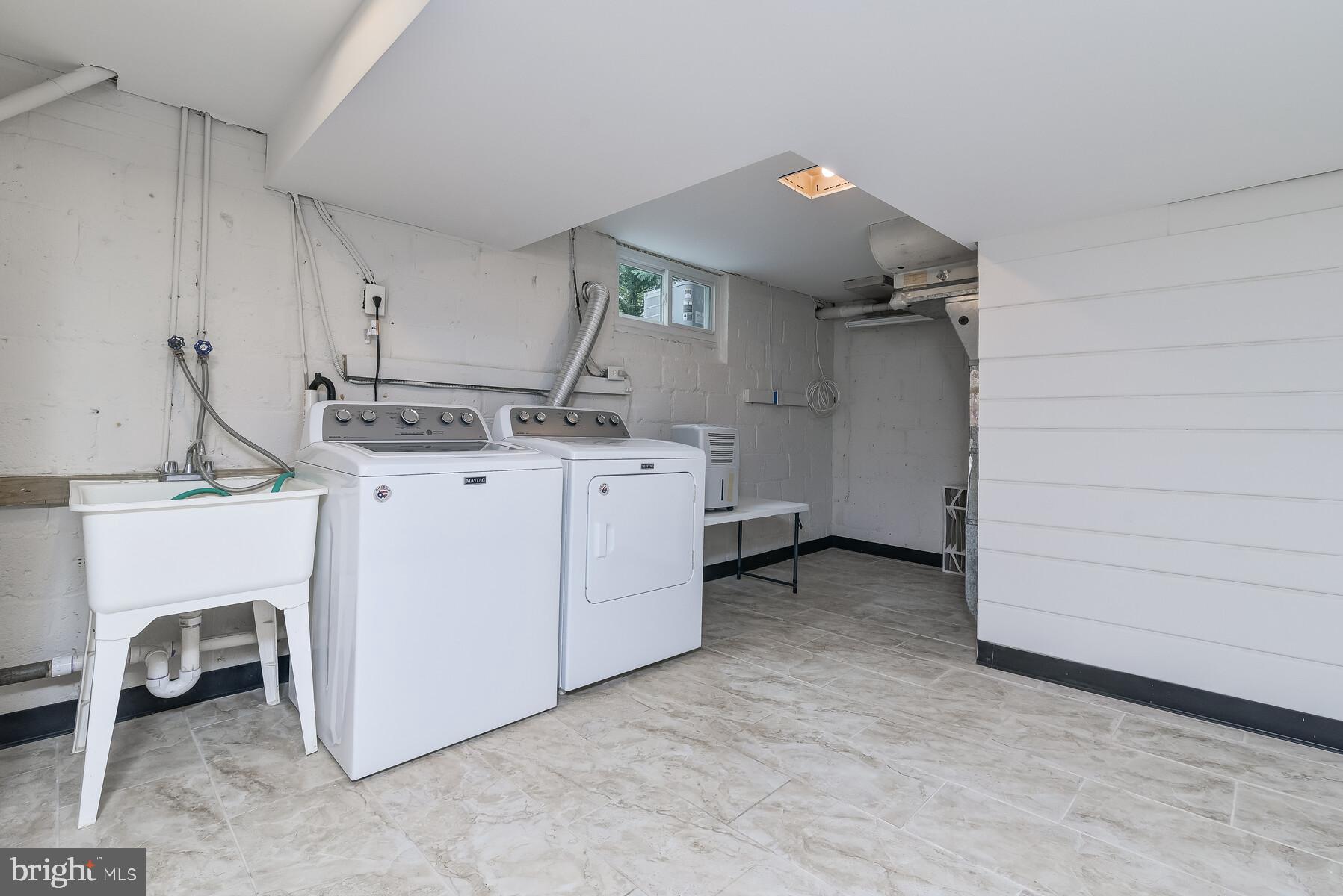 5705 Harwick Road Bethesda, MD 20816 - Photo 46 of 56 Utility room with 1/4 bath