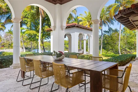 a view of a hallway view with wooden floor and staircase