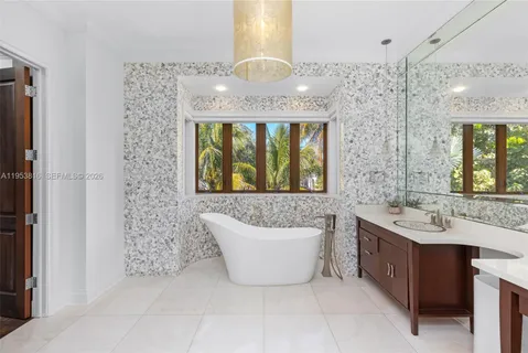 a view of living room with furniture and floor to ceiling window