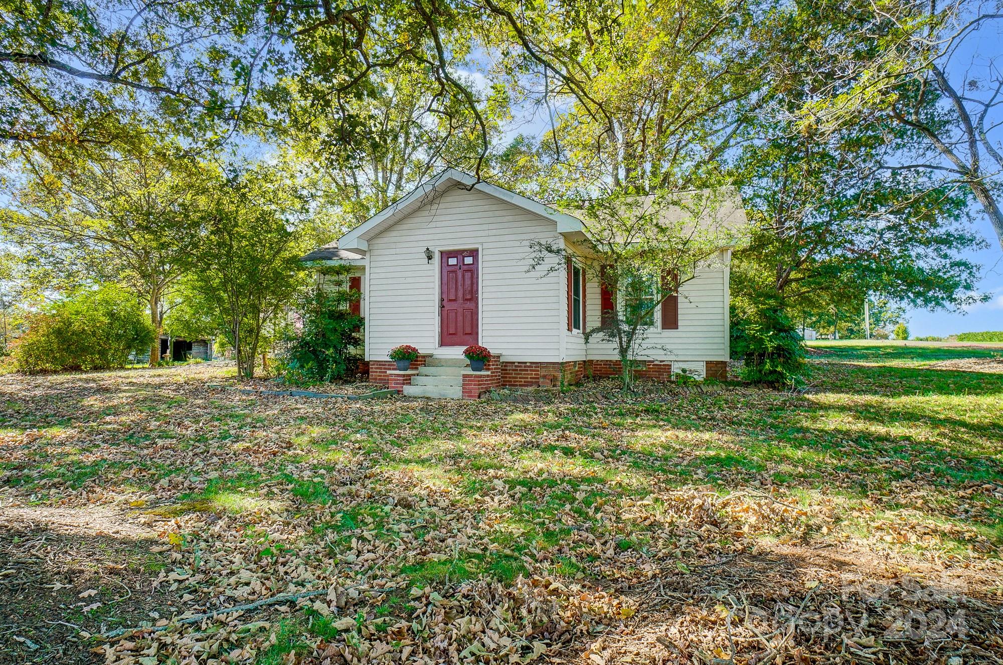 2020 Clontz Long Road Monroe, NC 28110 - Photo 3 of 30 a house view with a garden space