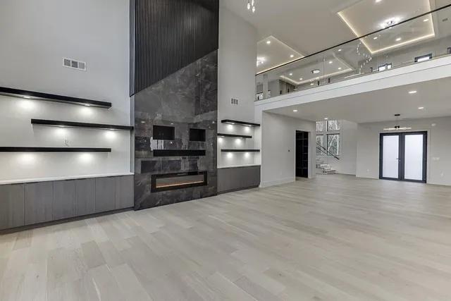 a kitchen with a stove and a refrigerator