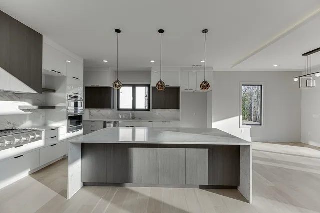 an empty room with closet and ceiling fan