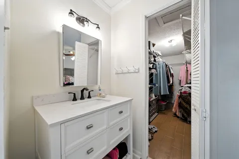 a en suite bathroom with a sink double vanity