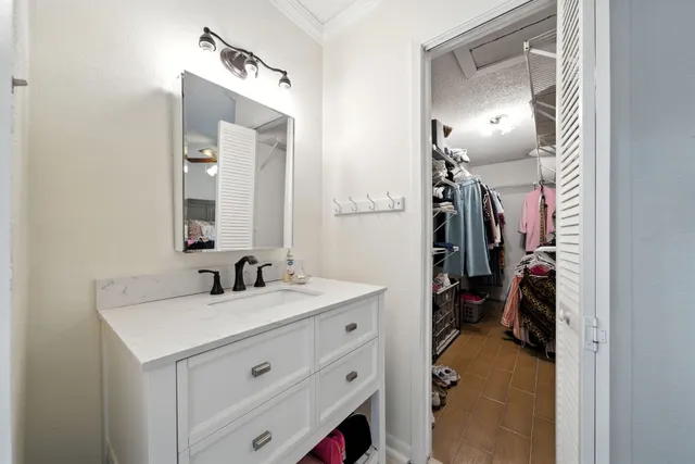 a en suite bathroom with a sink double vanity