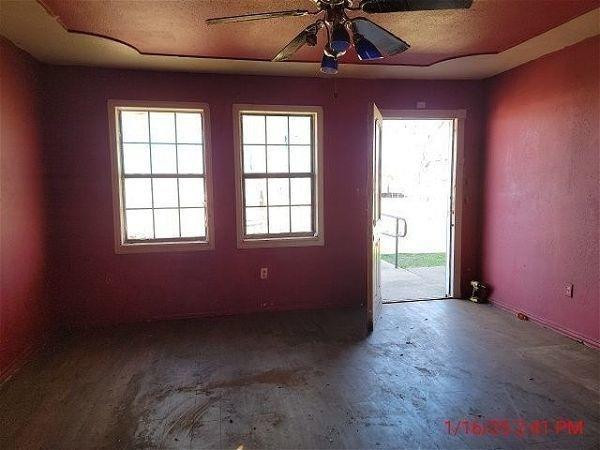 3006 East 3rd Street Lubbock, TX 79403 - Photo 1 of 13 an empty room with windows