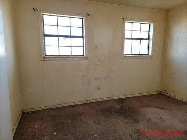 3006 East 3rd Street Lubbock, TX 79403 - Photo 9 of 13 an empty room with a window