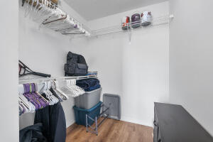 2236 North Cypress Bend Drive, Unit 311 Pompano Beach, FL 33069 - Photo 14 of 56 a workspace with furniture and wooden floor