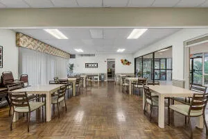 a view of a dining room with furniture