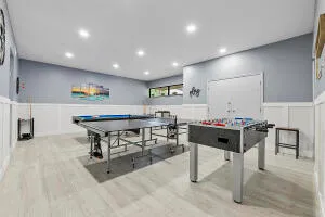 a view of a kitchen with dining table and chairs