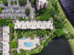 2236 North Cypress Bend Drive, Unit 311 Pompano Beach, FL 33069 - Photo 52 of 56 a view of an outdoor space