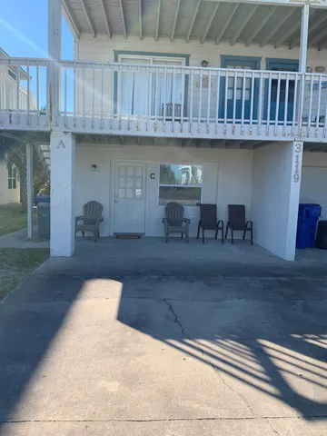 a kitchen with granite countertop a shelf