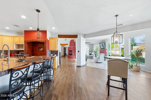 a view of a dining room with furniture window and outside view