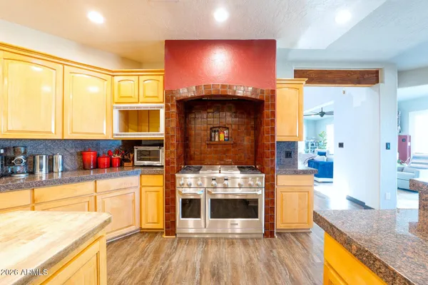 a view of living room with furniture and flat screen tv