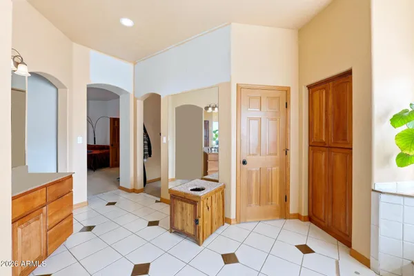 a view of entryway with wooden floor