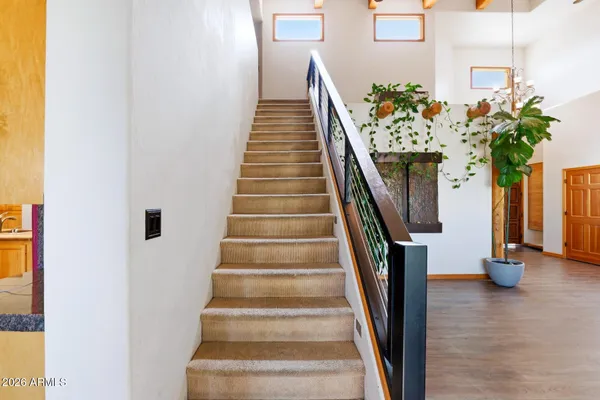 a bedroom with furniture and a bed