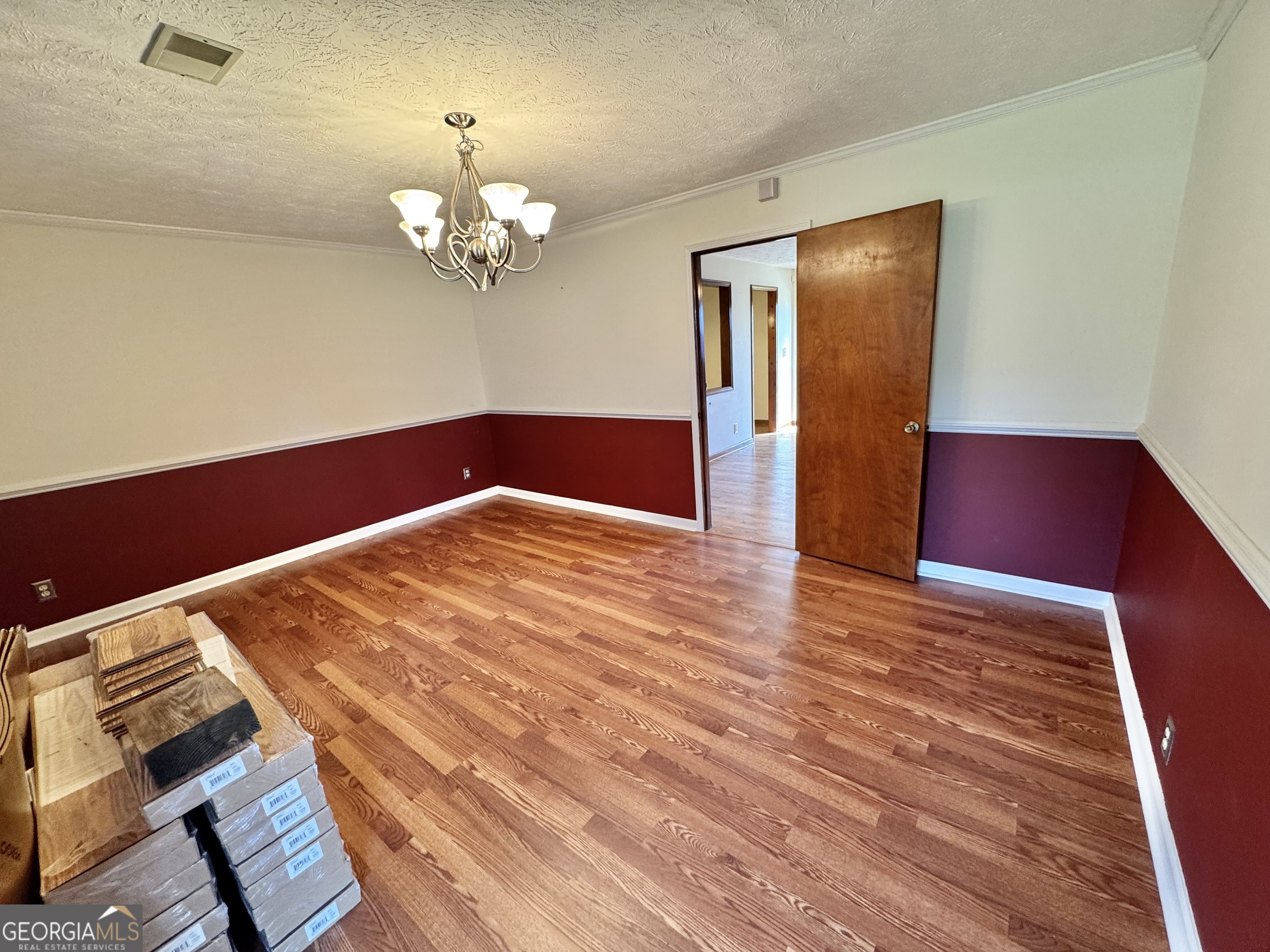 1760 Fears Road Rutledge, GA 30663 - Photo 6 of 68 a view of kitchen and hallway with wooden floor