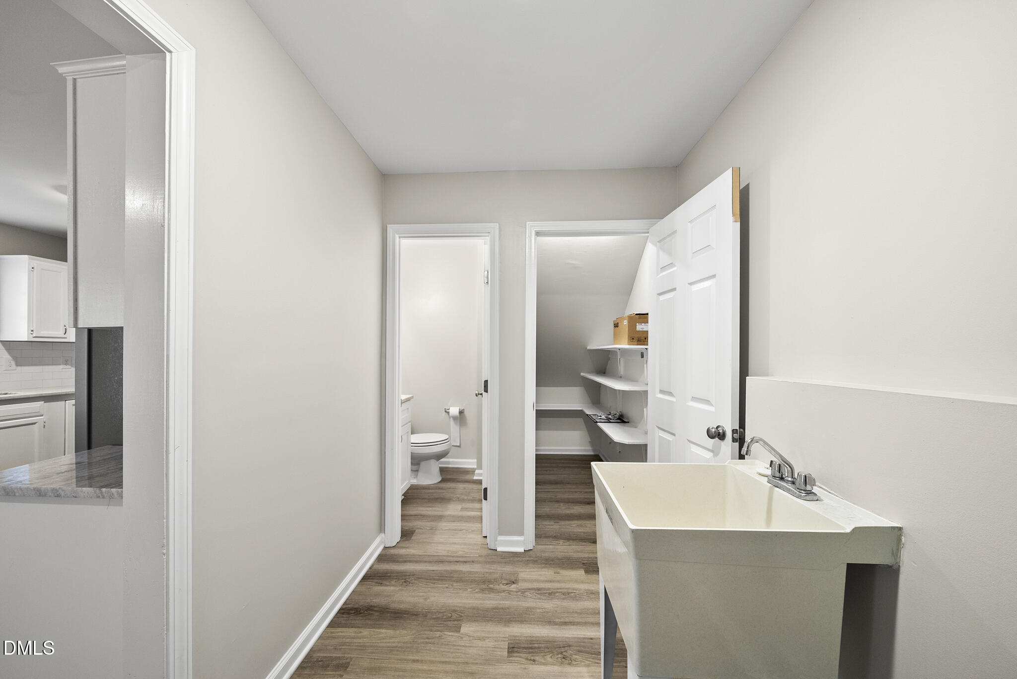 201 Tonylee Court, Unit B Raleigh, NC 27603 - Photo 17 of 29 a bathroom with a sink and a mirror