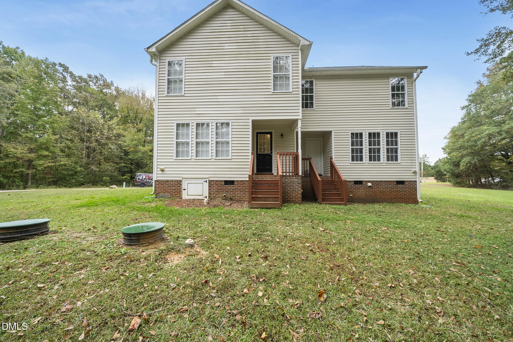 201 Tonylee Court, Unit B Raleigh, NC 27603 - Photo 20 of 29 front view of a house with a yard