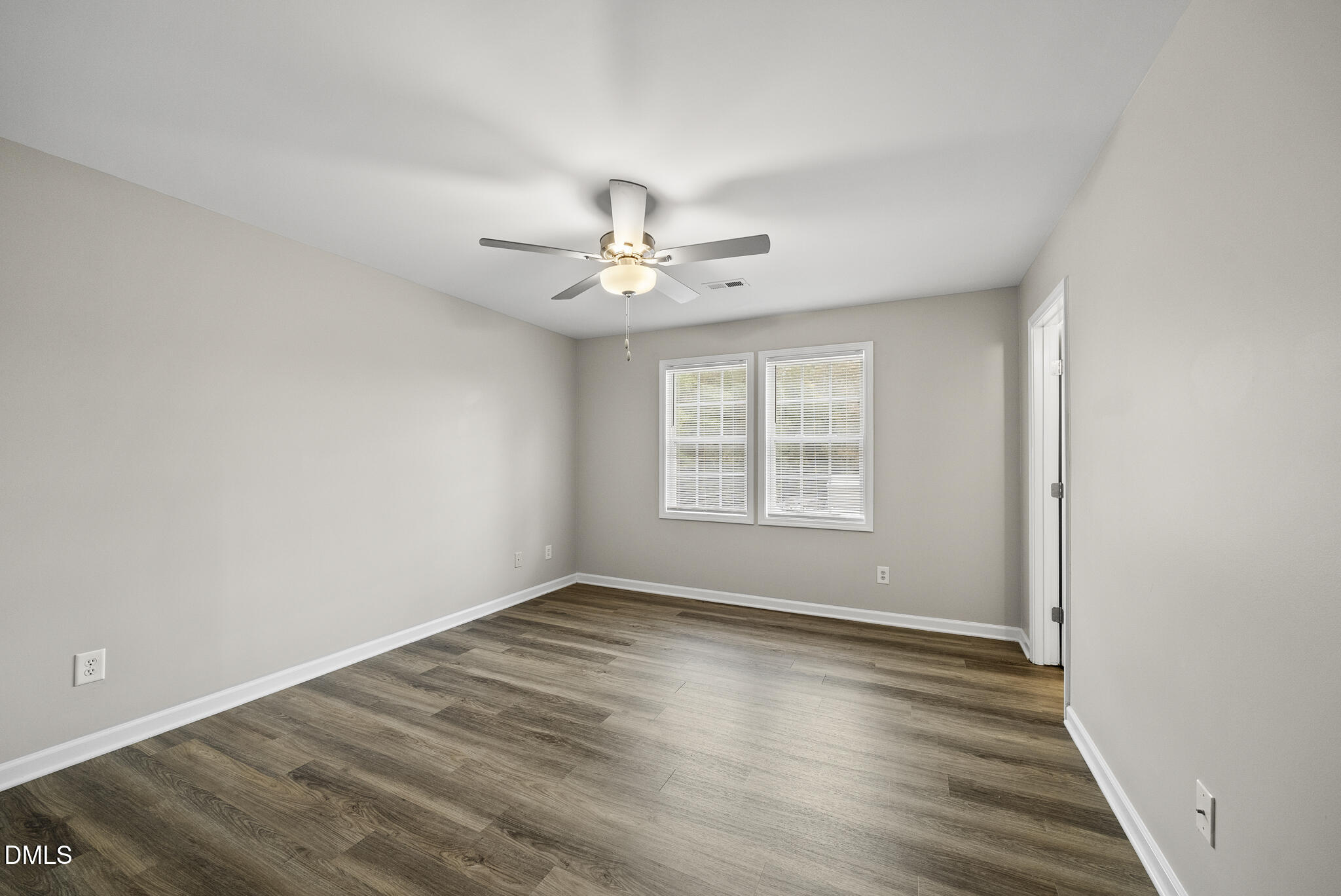 201 Tonylee Court, Unit B Raleigh, NC 27603 - Photo 26 of 29 wooden floor in an empty room with a window