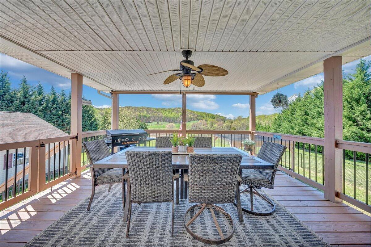 2947 Sandy Level Road Goodview, VA 24095 - Photo 2 of 73 a dining room with furniture window and wooden floor
