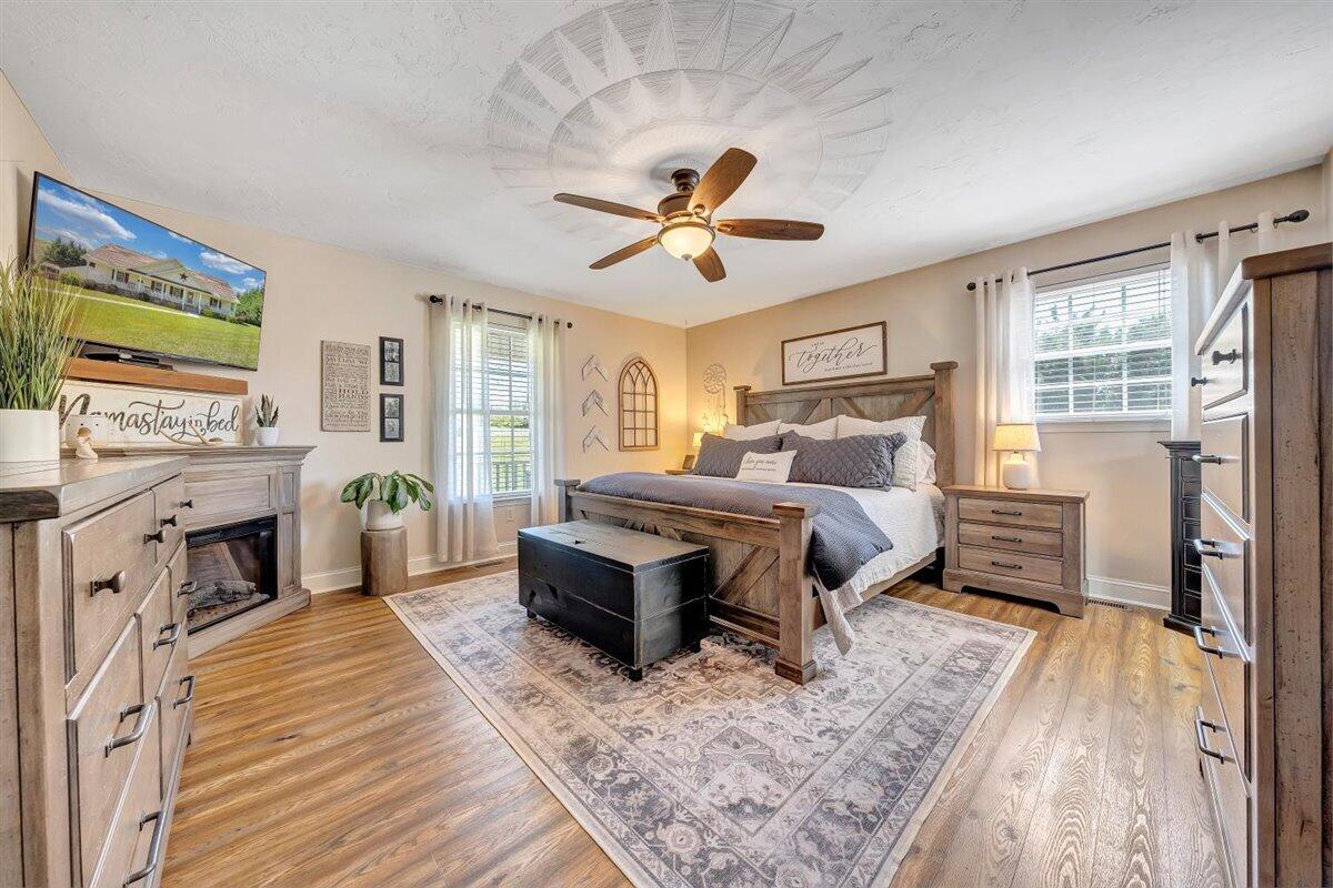 2947 Sandy Level Road Goodview, VA 24095 - Photo 21 of 73 a bedroom with a bed and a fireplace