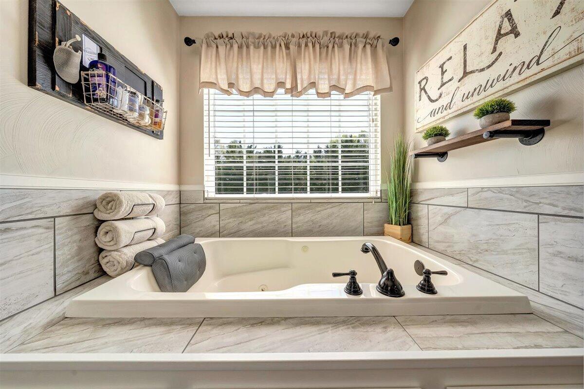 2947 Sandy Level Road Goodview, VA 24095 - Photo 25 of 73 a view of a bathtub in a bathroom