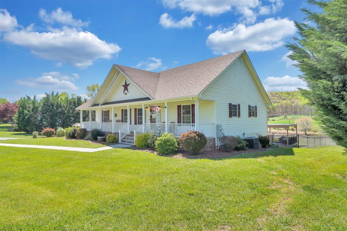 2947 Sandy Level Road Goodview, VA 24095 - Photo 41 of 73 a front view of a house with a yard