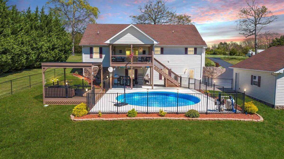 2947 Sandy Level Road Goodview, VA 24095 - Photo 5 of 73 a view of a house with a swimming pool and a yard