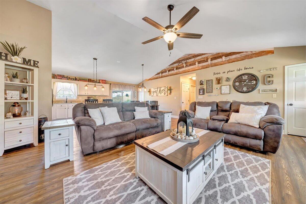 2947 Sandy Level Road Goodview, VA 24095 - Photo 10 of 73 a living room with furniture and a clock