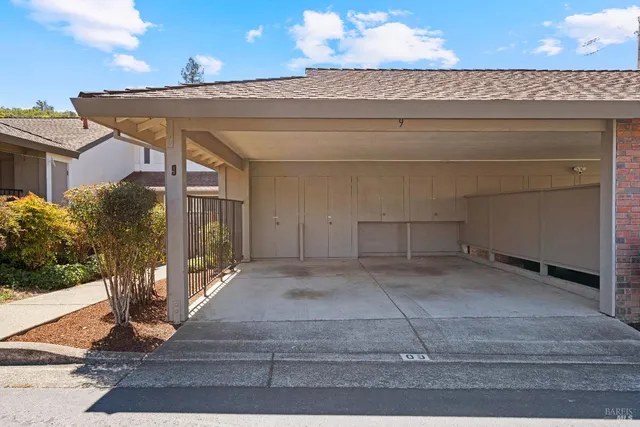 a view of a house with a street