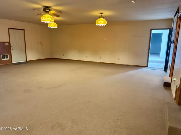 a view of walk in closet with cabinet
