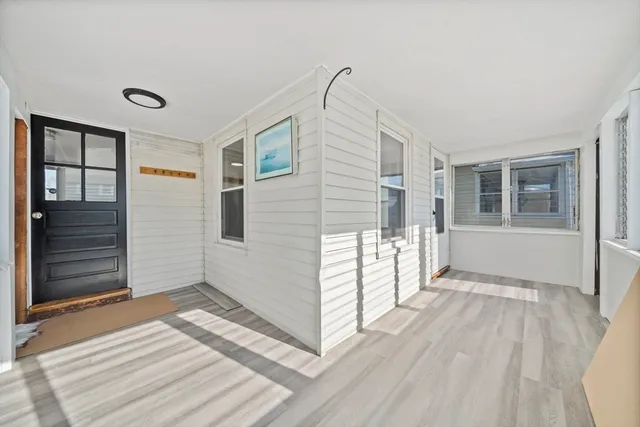 a view of a house with wooden floor