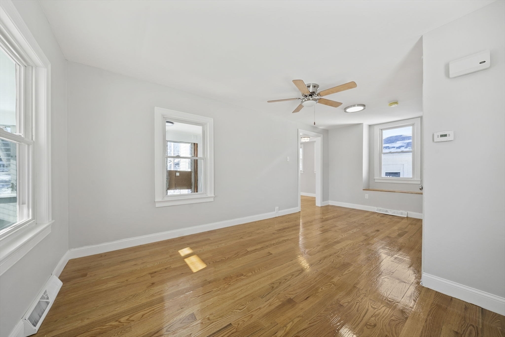 106 Darrow Street Quincy, MA 02169 - Photo 12 of 23 a view of an empty room with a window