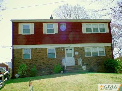 11 Long Hill Road Colonia, NJ 07067 - Photo 2 of 2 a front view of a house with garden